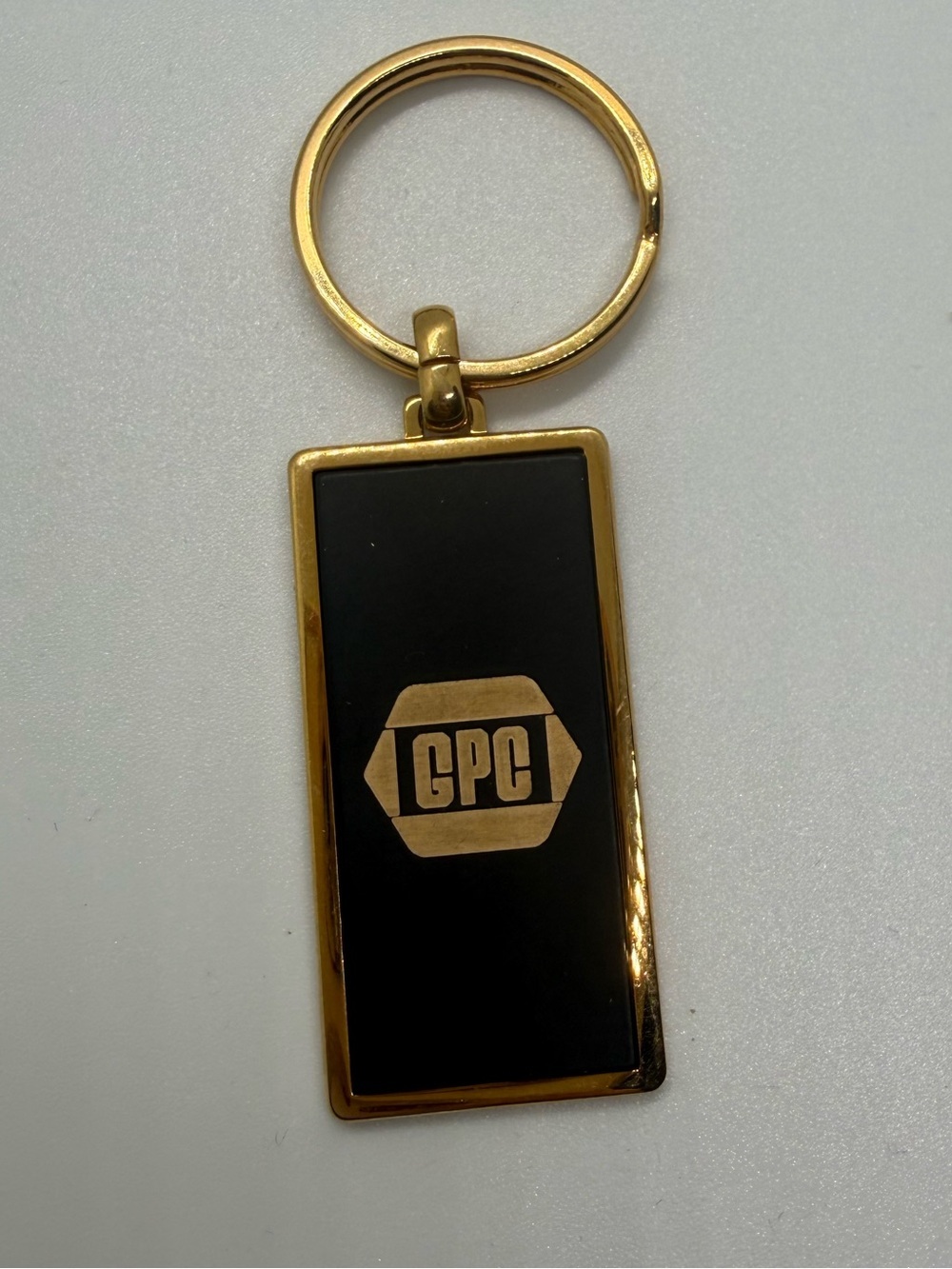 Vintage 1990 GPC Quota Maker Gold Tone Enamel Keychain